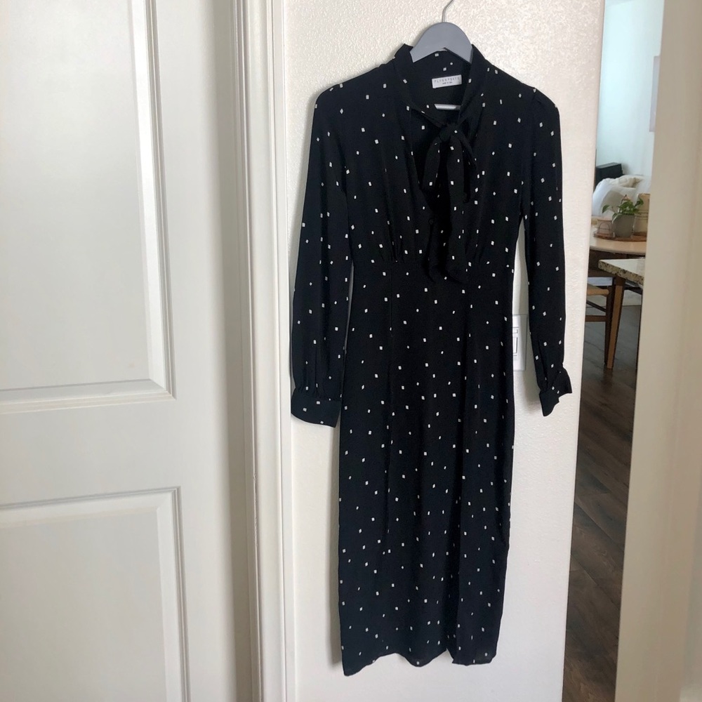 Black midi long sleeves dress with double slit.